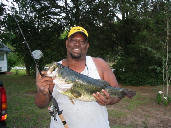 I caught this 7lb 11oz 22 1/2in Bass using a Zebco 11 Mirco Light Reel and Rod on May 14, 2011. The lure was a Strike King Bitsy Minnow 1 1/2 in 1/8oz. I was ending the day fishing for bluegills when she bite my lure. I caught her in a lake north of Crestview, FL.