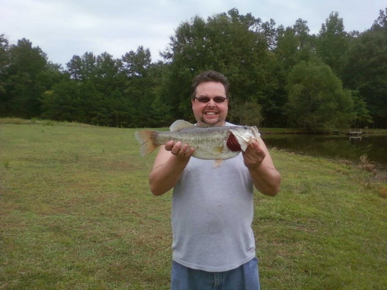 My name is Jonathan Dorton of Harrisburg,Nc.  I am HUGE FAN OF BILL DANCE OUTDOORS. This is a picture of a 6lbs Bass I caught at my brothers house. I would love to go fishing with Bill Dance one day. I can even bring him out to our shop and let fish our ponds.  Thanks and good catcing and fishing.