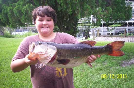 Taylor Creek, Okeechobee,FL. Weight 9.25 lbs, Length 24.5 Girth 18.5. Bait red shad worm 8in. rod bill dance quantam torsion 6.6 med heavy action      Donnie Watson JR 11 years old
