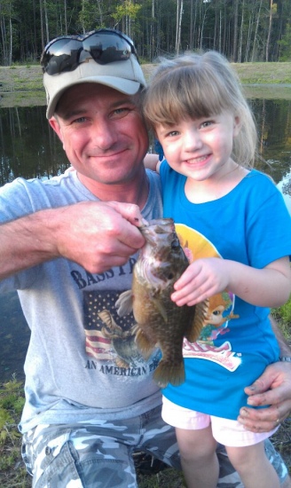 This is my 4 year old Halynn and her first warmouth. It is her first fish also. Kinda makes a daddy proud.