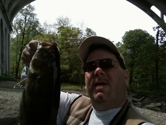 Hey Bill  Rocky River, Ohio Small Mouth, took pitcure myself. I have been a life long fan, watching you since I was a child, 44 now. just wanted to say thanks for all of the tips over the years, one of them helped land this lady. If you ever have a chance you have to come up north and give this river a shot in Mid May - early June.