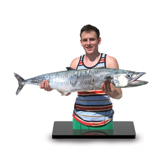 I caught this King Mackerel on the Yucatan Peninsula in Mexico last December. It weighed 28 lbs. The photo was bonded onto a piece of acrylic, and me and the fish were cutout and mounted on a stand. It's called a Fototrophy, and I keep it on the desk in my dorm room.