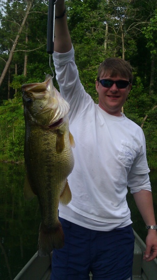 Dustin Love is shown with his 91/2 pound largemouth caught in a private lake in St. Clair county, Alabama.  Love caught his bass fishing a crankbait on August 3,2013.