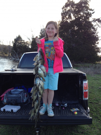 A double limit of crappie caught by Emma and her sister in Fayette County, TN on 3/29/15. She could barely lift the stringer up.