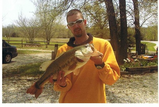 This photo was taken in March 2008. I was fishing a private lake in two feet of water. The fish weighed 8lbs.