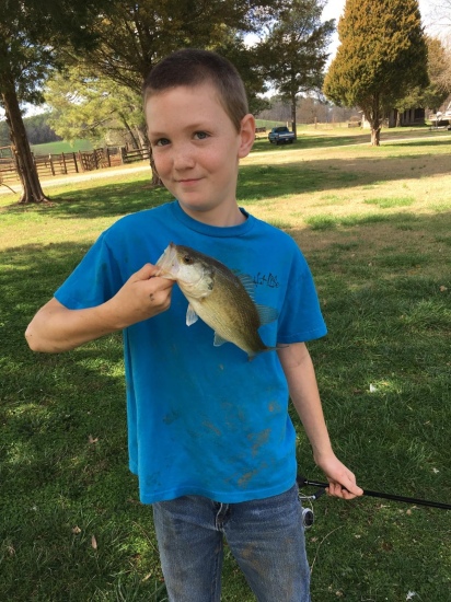 Christian Pence my 11 year old autistic son who LOVES to fish!!! He's Bill's #1 fan and hopes to catch a 