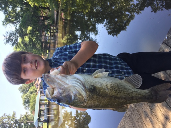 Took my nephew Lucas fishing on the Chickahominy River and he caught this nice Bass.  His first catch ever!
