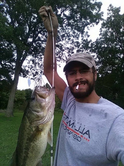 Grandpa's pond outside Adrian, MO. Didn't get a chance to weigh it but its wall worthy for sure
