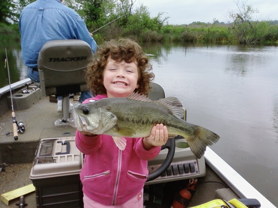 dani reeves 3,year old, caught this 3lb bass this past may in 3 to 4 foot of water while fishing with her papaw.