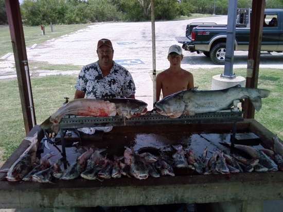 Ivan Welch and Thomas Anders photographed with a few blues from one check jug fishing at Choke Canyon state park just South of San Antonio, Texas.