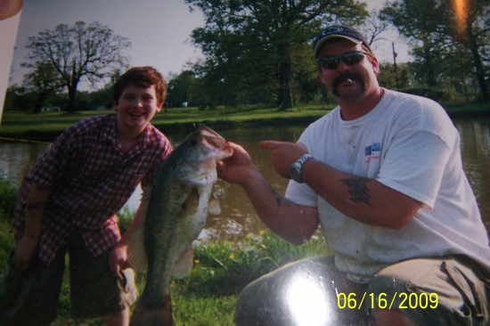 Cameron Jones caught this bass in a private pond. Dad is holding the 