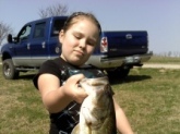 this is her first bass of 2011 and there will be alot more because she loves it more than anything and i have to say it because she makes me Bill Dance is her and her dads favorite fisher!!
