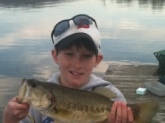 Jackson Paradise from Columbus, Indiana. 3 1/2 pound large mouth bass caught in Lake Guntersville, Alabama