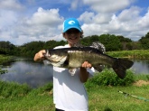 Joseph hauled in this 7lb Largemouth Bass from a small lake in Sarasota, Florida.  Joseph is an avid fisherman and loves to spend his time out of school on the lake or in the gulf hauling in (and releasing) monsters like this!