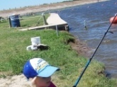 Elizabeth at 5yrs old learning to cast her first spinning rod. She was throwing soft plastics. We practice in the yard before we go to the lake.