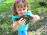 My 6yr old daughter Rebecca holding a nice perch she caught on July 4th weekend in Plantersville, TX.