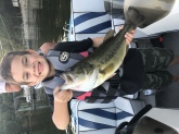 Reece my 6 year old son caught this bass on Lake of the Ozarks in October of 2017.  He caught and landed this fish all by himself. He was using a bass pro xps square bill in five feet of water off a sea wall in late afternoon.  The bass weighed almost five and a half pounds.