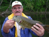 Karl Beckers with a nice 3# 18 inch Delaware River Smallmouth, taken on a Jitterbug, at Belvidere, NJ, Saturday, 16 May 2009.