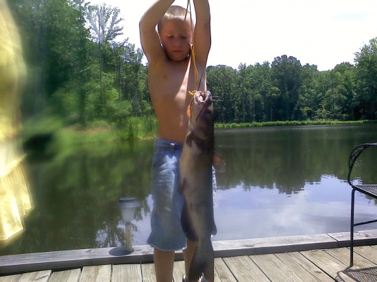 My son, Tyler Nelson 6 years old caught this fish at a lake in Thompston GA.  He's my Huck Finn!