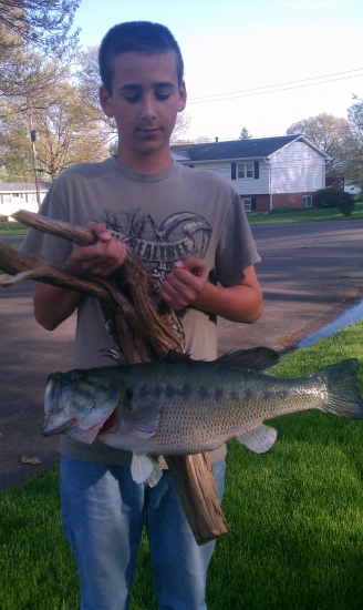 I caught this 8.8 lbs bass on June 3rd 2011 in my uncle jayson's farm pond, which is located north of Bucklin, MO.
