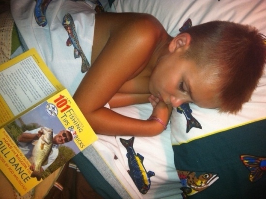 This is my son Clark Gibney after a long day of fishing in Toledo, Ohio. He fell asleep with a Bill Dance book. Clark is obsessed with the sport of fishing and just LOVES to watch videos and read books about fishing. He is 9-years-old and so happy we live near Lake Erie. Susan Gibney