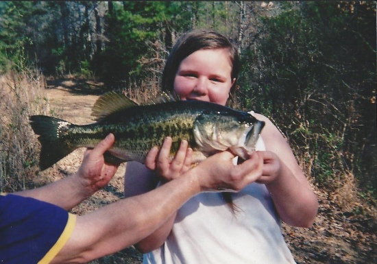 My beautiful sweet 10 year old daughter caught this six pound bass on a junebug zoom texas rigged lizard a hard technique for a child for sure