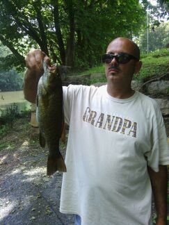 18 inch smallmouth caught on a shad crappie crank bait at the sckullkill river on Port Clinton ,PA.
