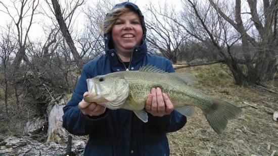 I caught this beautiful bass in a private pond in Texas.  I do not know its weight.
