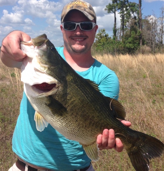 Poinciana Fl. Small pond near the house. It was early May and I caught her off the bed on a zoom super fluke. Took 10 different baits and a total of 1 1/2 hrs to finally get this 9.5 lbs. 25 in. toad to the bank.