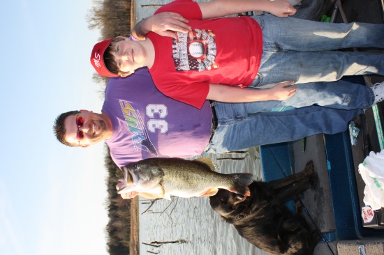 Another picture with me and my son Christian and dog Scruffy and my 11.3 lb Bass.