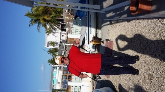 This is my father, who is mistaken for Bill Dance almost everywhere we go. He is holding a French Grunt caught in Key Largo one morning. He loves to get up and catch fish while still in his PJs while he drinks his morning tea, so I wanted to share.