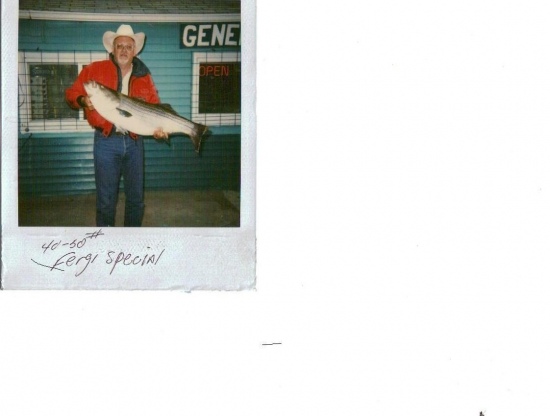 42# 2OZ STRIPER caught at 2am at lake mcconaughy reservoir in nebraska. caught while vertical jigging for walleye. 10# TEST line on a borrowed rod and reel. took 1hr 10 minutes to land. still 22#'S short of the state record.