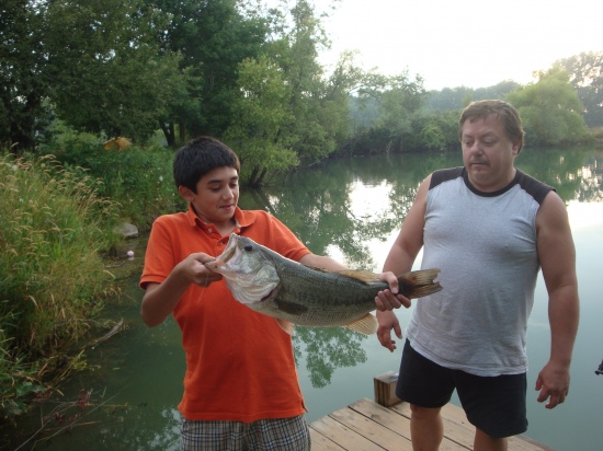 This my grandson Daniel, 12 yrs old,and uncle, the bass was caught by grandson, great job