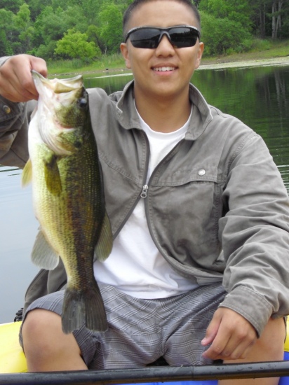 I caught this bass at East twinlake in MN. It a weighed in about 3 lbs 9 oz i was using my own custumized spinner bait. The next day me and my brother went back out and i caught a 4 lbs 3 oz bass in 4 ft of water in the lily pads.