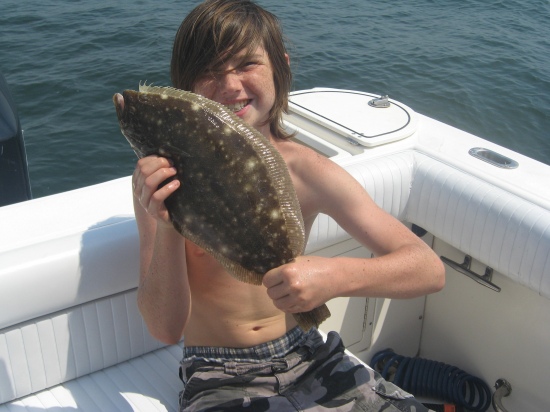 This flounder was caught in the Delaware Bay on a Minnow/Squid combo. It was 19inches and was later made for dinner.