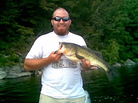 Not sure exact weight, but if someone could help guess I'd appreciate it. My shoulders are 21 inches wide. I caught it at the Quabbin Reservoir in Massachusetts. It was my first and only fish ever caught on a football head jig with a chigger craw trailer.