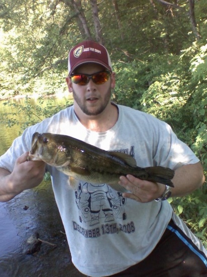 I caught this large mouth bass and sunny bank in pompton lakes new jersey. it was about 20 inches and close to five lbs. though  it's not that big, it's the biggest i've seen and caught in nj.