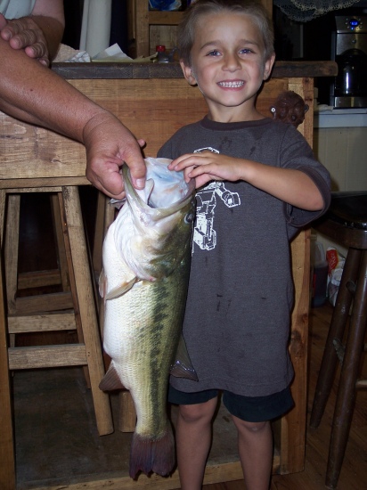 Hey Mr. Bill, My name is Krissy Juneau from Central Louisiana.  I am a proud mother of 4 beautiful kids! I have 3 boys; Julian 9; Jayce 7; Jonah 5; and little girl Jon-Riley 3! They all love to fish, but Im writing about my 7 year old Jayce! He has been living and breathing fishing since he's old enough to pick up a rod and reel!! At first we just thought he loved the outdoors like every other kid his age, but when he got about 5 or so, we quickly learned different.  He wouldn't care what the weather conditions were, or if it wasn't a great season to fish, etc., He just wanted to learn everything there is to learn about it.   He would practice casting and reeling for hours. Yes, he would catch alot, but his biggest catch is an 8.4 pound largemouth,  (I sent you a pic!) He got so excited! He insisted to reeling it in himself though, but he did need his papa's help to use the net to pick it up out of the water.  You see, when you ask some kids what they want to be when they grow up some say a doctor, others say a cop, not Jayce!! He has always said, he wants to be a pro fisherman, and he's sticking to it!! When some adults in our neighborhood hear about Jayce they laugh and say 