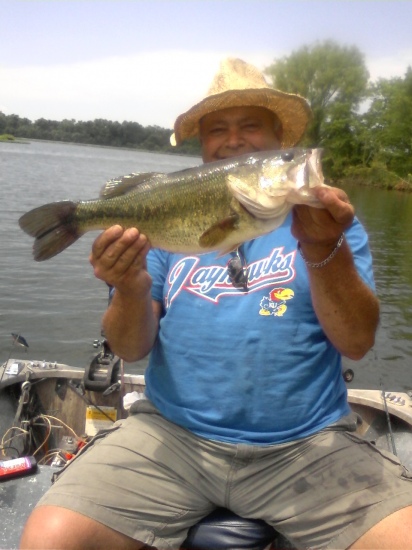 25inches big ole fat belly gal, used a wave worm bamboo tiki stik green pumpkin kansas st lake eastern ks. Caught on 5/0 gama hook with 1/4 oz barrel wt. just slow popin deep. The pole 6.5' was a bass pro med. crankin pole with a bass pro tourney bait caster on triliene 12lb test. I like the tri line it stands up to abuse yet I get decent hook sets and great feel on my plastics. It is essential to me to feel them sucking on em or if they are running with it to determine how to set. when they run I like a more suttle sweep to side then a hard pressured pull and when sucking it or tasting it a rapid up motion works best. I like just skim hooking my worms it keeps me at 98% sets. on this day memorial day 2010 three of us caught 60  all 15