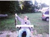 Hello Everyone, I was in a car accident in 2002 that left me paralyzed from the chest down, but with use of my arms just not my finger's.  Fishing is my favorite thing and watching my man Bill Dance on TV got me through some tough times.  My best friend built me this rod holder and I caught my first 2 1/2 pounder in 8 years.  Mr. Dance and my good buddy gave me the inspiration to get back out there and do what I love!!