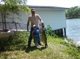This was my son's first fishin trip with me tryin to get some blue gill when we were over come by a large school of carp. he was useing his shakespere spiderman pole when this carp snapped his line so i rigged one of my poles for him and let him use it. the carp hit his line and the hook set. i was holding him and the end of the rod while he was reelin it in and he kept tryin to get me to move by elbowin me away and sayin i got it daddy. when his little arms got tired he told me to get it in. he made me so proud wanting to do it by his self. it weighed in at 18lbs. not bad for a first fish. it was caught in Lake Asbury in Middleburg Fl. thanks for the many years of shows bill. Leonard