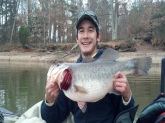 My 15 year old son Izak caught this LMB on December 8, 2012 at Tar River Reservoir North Carolina while kayak fishing.  It weighed 10lbs, 7oz and was caught on a Rapala shad rap crankbait at 10:10am.  It was released unharmed...but angry after getting several photos taken!