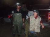 This fish is a 3 foot, 20pnd coho salmon. I caught ti at the manistee river,Michigan. I am the kid in the right of the photo. I caught it in the fall of 2008. My dad is on the lef with his small catch of the day.