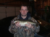 i caught this walleye at the red wing dam in minnesota i never got to weigh the fish but it was twenty six inches long and it was february