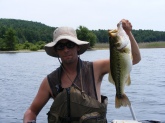 4lb Caught at Quabbin Reservoir in Hardwick, Ma. Mid-day On a #7 yellow perch Jointed Suspending Shad Rap.