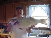 This Hybrid Striped Bass weighed 19lbs7ozs. It was caught at Barren River Lake in Allen and Barren Counties in South Central Kentucky. The monster fish was caught on a Diamond Shad Spoon. It was caught in 2005 and is still the current standing Lake record.