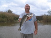 Capt. Lynn Pridgen with a nice speckled trout caught in Mobile river on March 24,2009