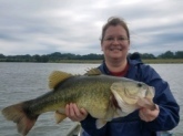 This awesome bass was caught in a pond in Marion Alabama.  The biggest bass I've ever caught!  It weighed 10 lbs. 5 oz. I was fishing with my Quantum Bill Dance Special Edition Baitcast Rod and Reel purchased for me by my husband.  He told me to catch big bass I needed to learn to use it and get rid of the Zebco 33...LOL.  He tied a washer to the line and I practiced casting in the yard until I got good at it.  And it paid off- look what I caught!