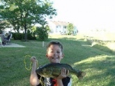 the largemouth was caught in a local pond and was 18 inches 4 1/2 pounds it was his largest bass at the time