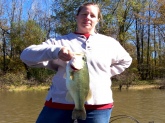My wife, Melissa, caught this 4 lb. bass on Lake Barkley, TN. We were fishing a fall pattern, following the schools of baitfish. Water levels were high for the time of year and the fish were pushed up in the newly submerged grass. This is the biggest fish she has caught to date and used the dancin' eel that was used on your show. We bought one after we saw the show and have been able to catch fish when others can't!!!!